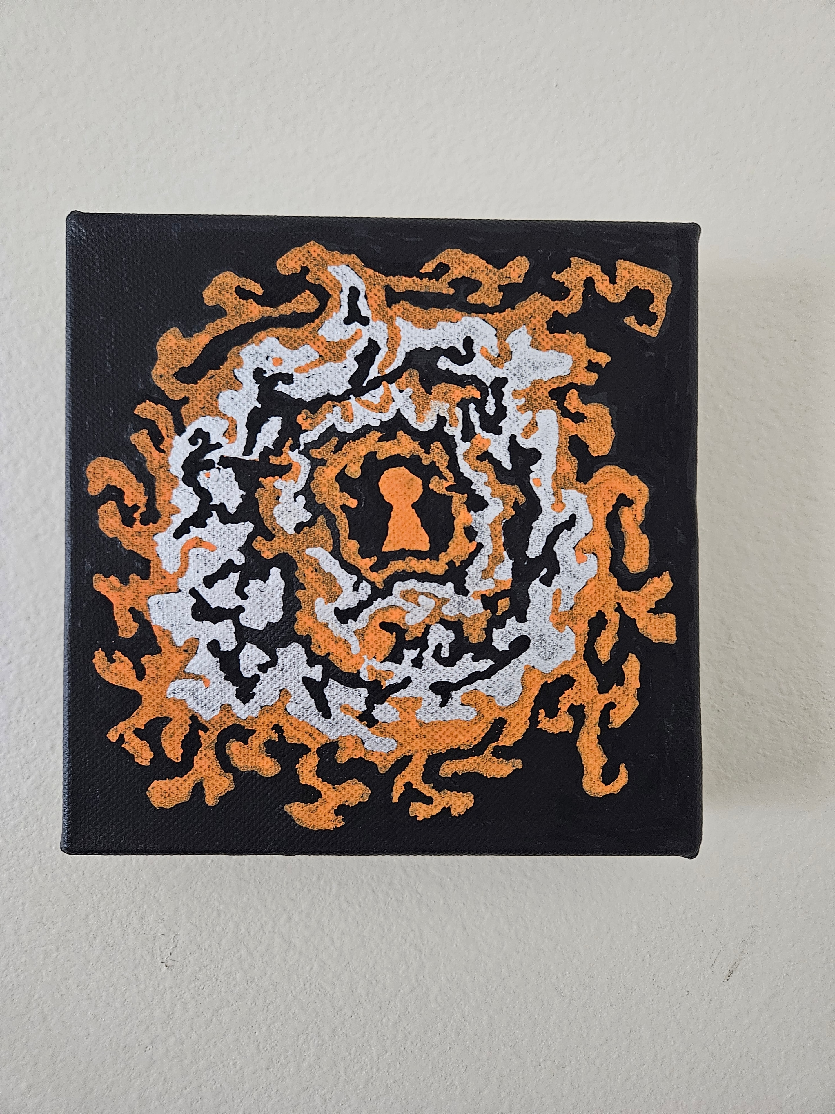 Untitled Keyhole — black canvas with layered orange, silver and gold geometric organic shapes forming a keyhole composition